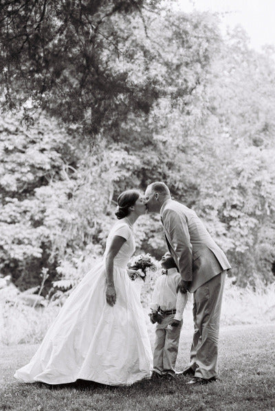 Husband, Wife, and Son on Wedding Day